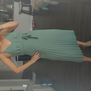 Green pleated dress